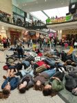 Extinction Rebellion Youth stage die-in at Manchester Arndale